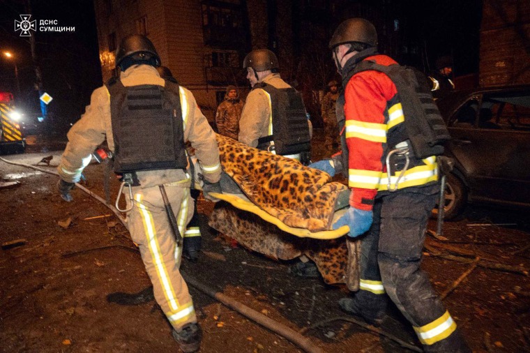 Rescuers save 2 victims from a house destroyed in the Russian shelling in Sumy, Ukraine