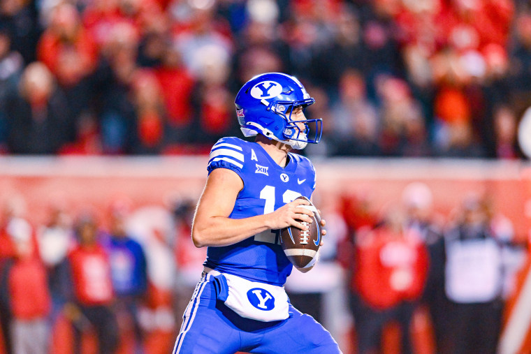  Jake Retzlaff holding a football 