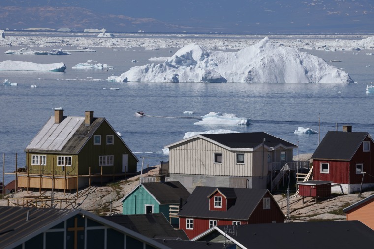 Icebergs drift by in Disko Bay on July 15, 2024 at Ilulissat, Greenland. 