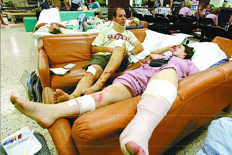 Chris Xaver and Scott Weatherby in Thailand after the tsunami in 2004.