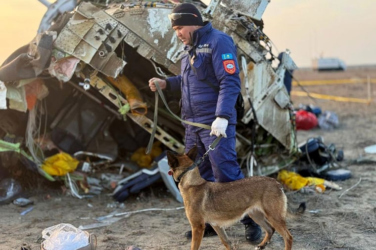 Rescuers work at the wreckage of an Azerbaijan Airlines flight near Aktau, Kazakhstan, on Thursday.