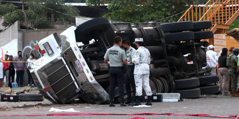 US authorities say new cross-border strategy led to six arrests in deadly truck smuggling case