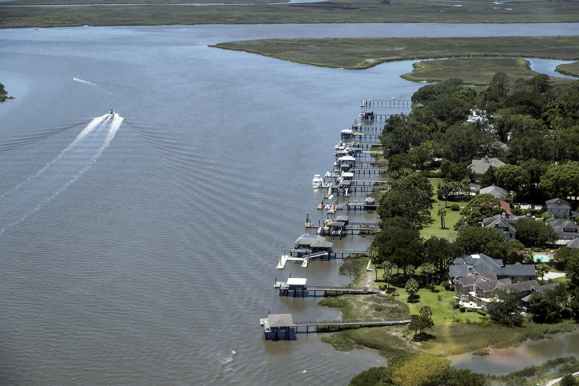 An aerial view of coastal land and water.