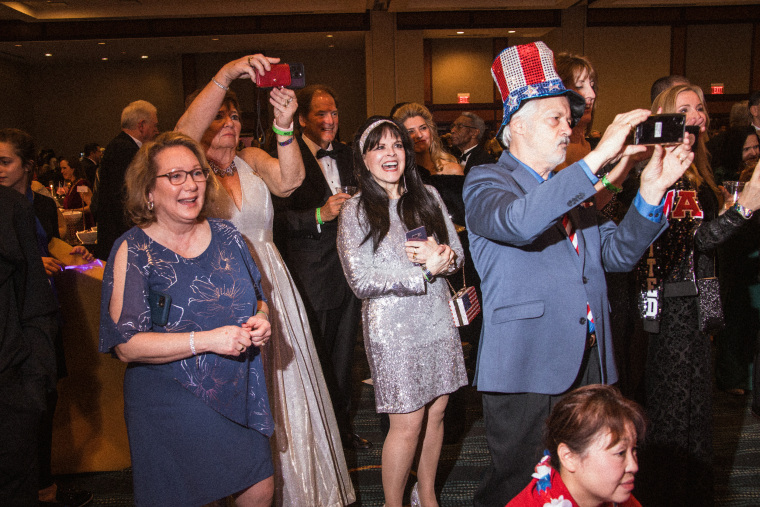 Trump supporters celebrate at an inaugural ball at the Hyatt Regency on Jan. 18, 2025.