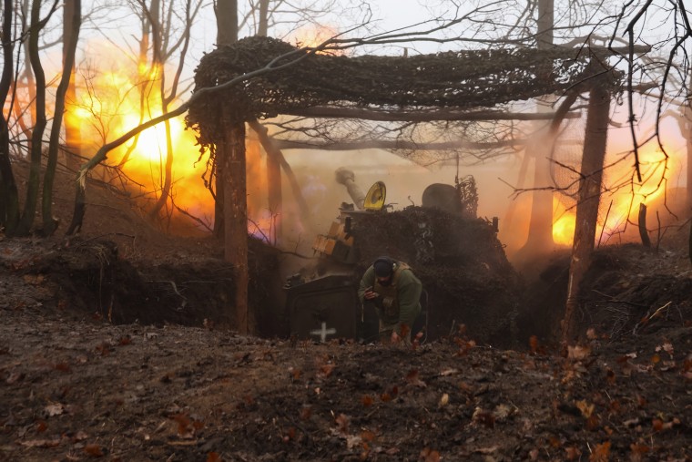 Artillery crew of the 37th Marine Brigade fires with 2S1 Gvozdika self-propelled howitzer on position of Russian infantry on December 24, 2024 in Donetsk Oblast, Ukraine. 