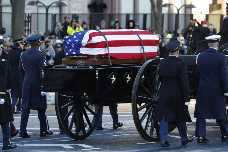 A horse-drawn caisson carries the flag-draped casket of former President Jimmy Carter to the Capitol  on Jan. 7, 2025.