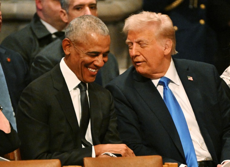 Former President Barack Obama speaks with President-elect Donald Trump