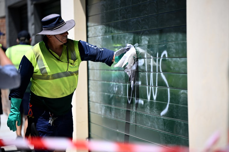 More cars and buildings have been spray-painted with anti-Jewish slogans as the nation's leaders remain at odds on how to combat a string of attacks amid rising community anguish.